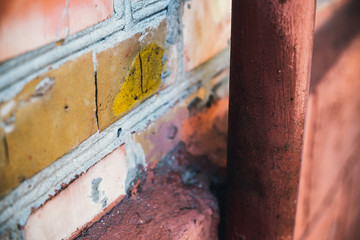 Red brick wall. Bricks are fastened with mortar.