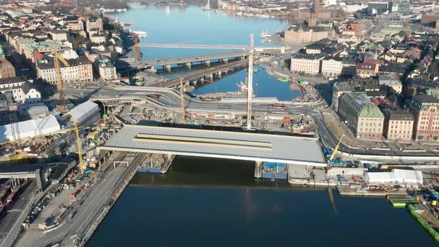 Pan right aerial shot of Golden Bridge & Slussen construction site in Stockholm