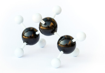 Obraz na płótnie Canvas Plastic ball-and-stick model of a propane (chemical formula C3H8) molecule with on a white background. Propane is commonly used as fuel.