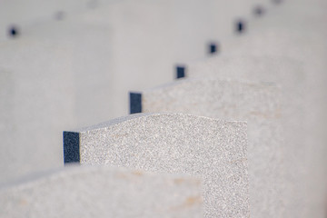 row of anonymous graves