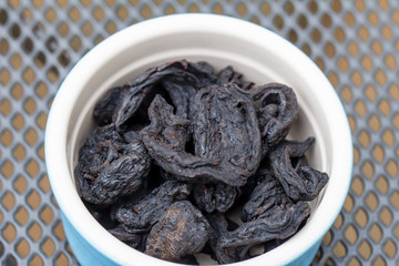 Garcinia cambogia or Goraka, Garcinia gummi-gutta, is a tropical sun dried fruit used in cooking in India, Sri Lanka, Indonesia, Thailand, Malaysia and Burma