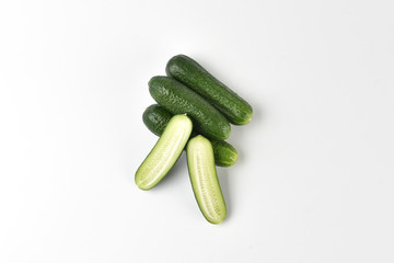 Fresh green cucumbers isolated on a white background