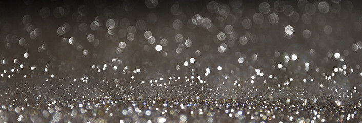 Christmas and Happy new year on blurred bokeh with snowfall banner background