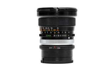 Old manual wide-angle focus lens on mount adapter ring