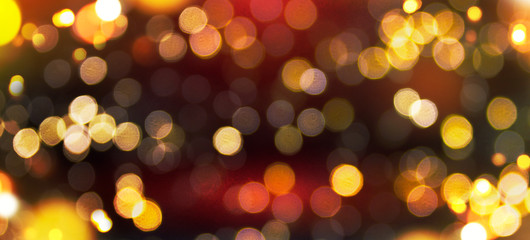 Blurred background with bokeh. Christmas and Happy New Year greeting card.