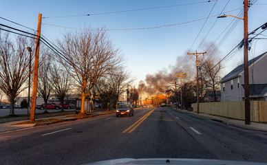Fototapeta na wymiar Smoke of the fire incident at the car dealer 
