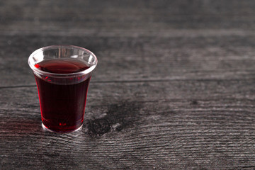 Elements of the Holy Communion or Lords Supper on a Wooden Table