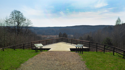 A viewing platform over the valley of the forest river