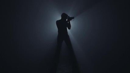 Photographer in dark