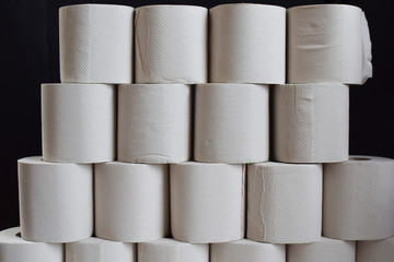 close up of a toilet paper on black background