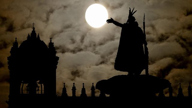 Incas King Pachacutec, Time Lapse by Night with Dark Atmosphere, Full Moon and Silhouette of Monument in Plaza de Armas , Cusco, Peru