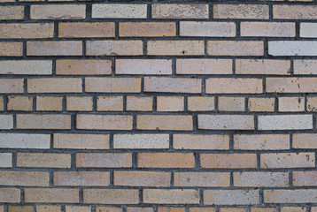 Background of orange brick wall texture, relatively fresh brickwork