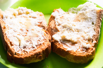 Cottage cheese toast on a green plate