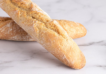 Loaf of Fresh French Baguette on a Kitchen Counter