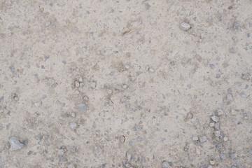 rocky path. dry soil with small stones background