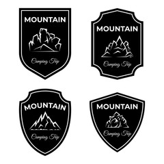 Obraz premium Set of mountain logo designs. Camping trip, active lifestyle vector badges templates.