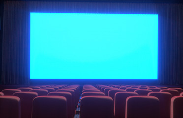 cinema interior of movie theatre with empty red  and black seats with copyspace on the screen and glow on edge, concept   of recreation and entertainment 3d render
