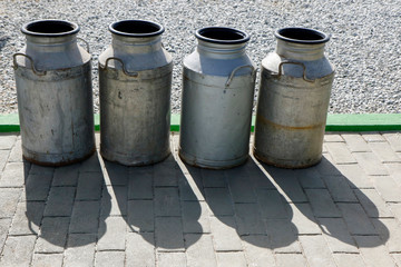 old metal cans for milk transport