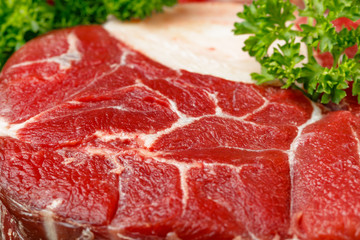 Close up of fresh uncooked rib eye steak, premium meat