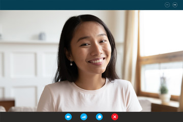 Headshot portrait screen application view of happy millennial Asian girl talk on video call online, smiling young ethnic woman speak have pleasant Webcam chat on laptop, quarantine alone at home