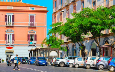 Tourists in street in historical part of Sorrento reflex