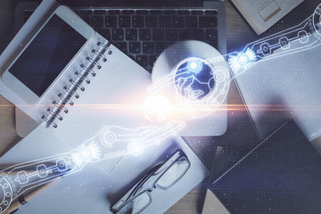 Double exposure of technology theme drawing over work table desktop. Top view. Global data analysis concept.