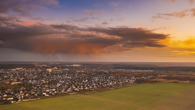 Dobrush, Gomel Region, Belarus. Aerial View Of Residential Area With Houses In Countryside. Sunny Autumn Evening. Sun Shining Above Town Skyline During Sunset. Hyperlapse