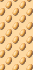 Seamless pattern of raw potatoes on brown background. Food texture