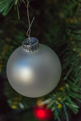 silver christmas ball on tree