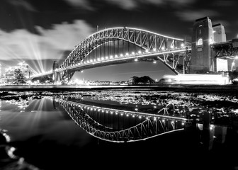 Black and white photo of Sydney Harbour Bridge at night