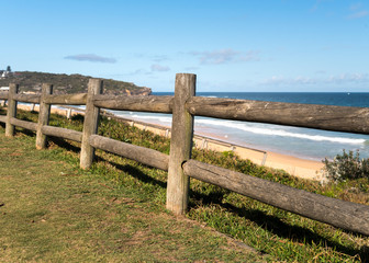 Fototapeta na wymiar Fence by the beach,Curl Curl Beach, Australia