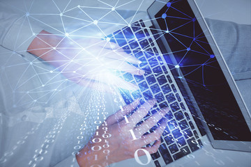 Double exposure of woman hands working on computer and data theme hologram drawing. Top View. Technology concept.