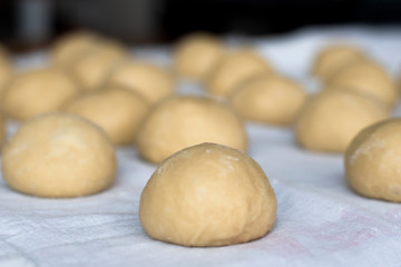 Fototapeta na wymiar Homemade bread preparing the dough. Homemade raw bread dough