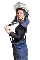 Young beauty woman firefighter pulls suspenders on her pants, smiling and looking to the camera