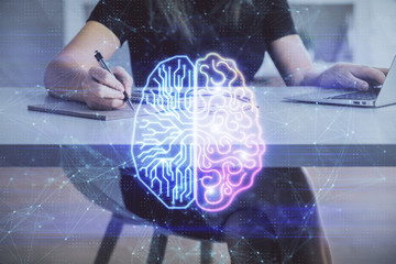 Multi exposure of woman hands working on computer and human brain hologram drawing. Ai tech concept.