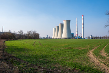 Fototapeta premium coal power plant with green field around, czech detmarovice 04.01.2020