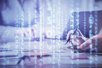 Double exposure of woman hands working on computer and data theme hologram drawing. Tech concept.