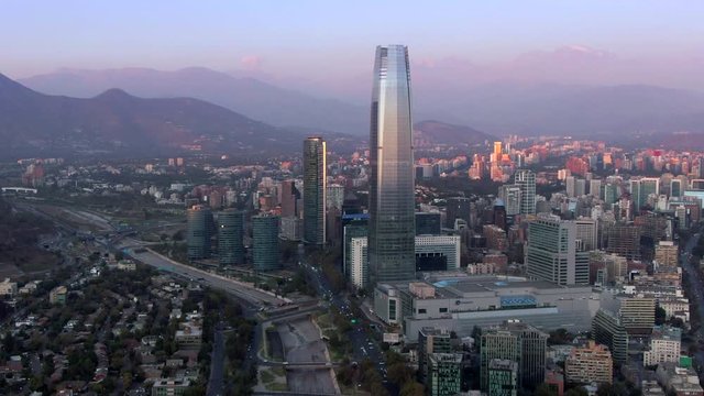 Santiago, Chile, aerial view of financial district showing landmark buildings at sunset.