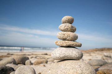 Fototapeta na wymiar balanced stones on the beach