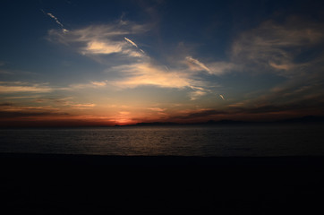 Beautiful sunset with plane traces in Rhodes