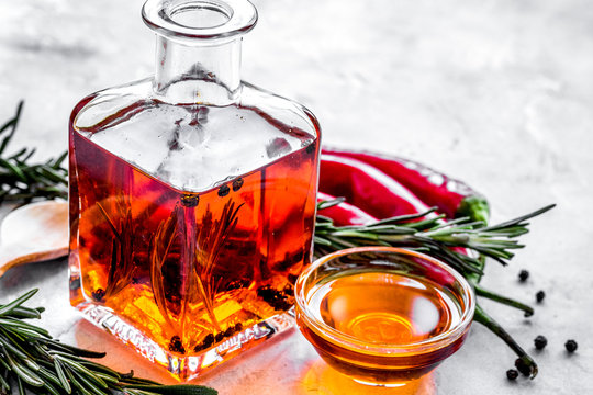 natural oils concept with fresh chili paper on table background