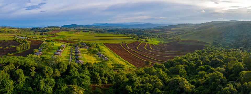 Aerial View Of Sasakwa Lodge In Singtia Grumeti Reserves, Tanzania Near Kilimanjaro Volcano. Beautiful Jungle Lodge.