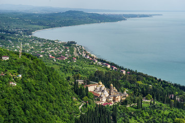 Fototapeta na wymiar Landscape with a view of the new Athos monastery.