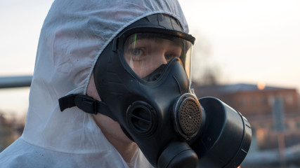 Man in respirator in biohazard zone