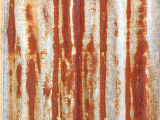 Rust on Galvanized corrugated sheet, rustic background, weathered background. Metal sheet with rusty