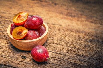 Fresh Prunes on a wooden background, Fresh Plums on the wooden table