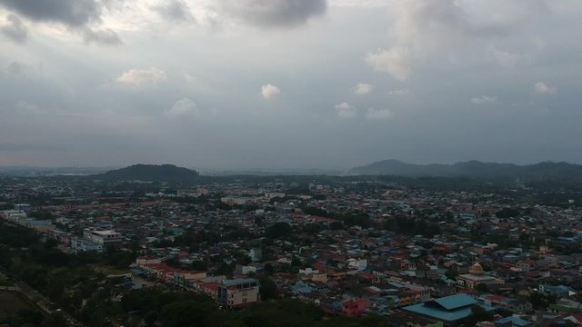 Aerial shot of batam island in afternoon,cloudy.In the background is a complex of densely populated buildings.batam city,indonesia