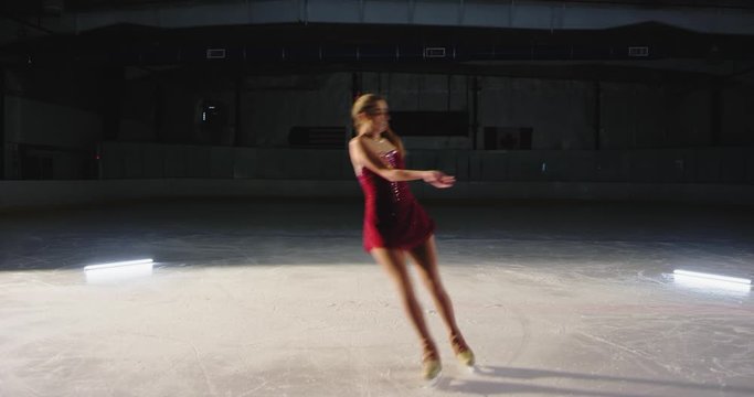 Girl figure skater performing routine
