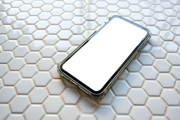 Mobile phone blank screen to fill graphics Placed on the area with a hexagonal honeycomb mosaic...