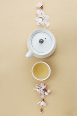 Fototapeta na wymiar Tea and flowers on the table